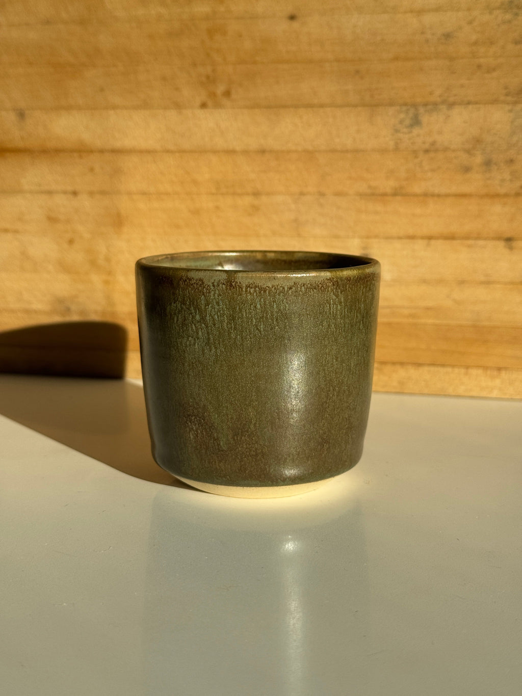 Ceramic mug with olive glaze