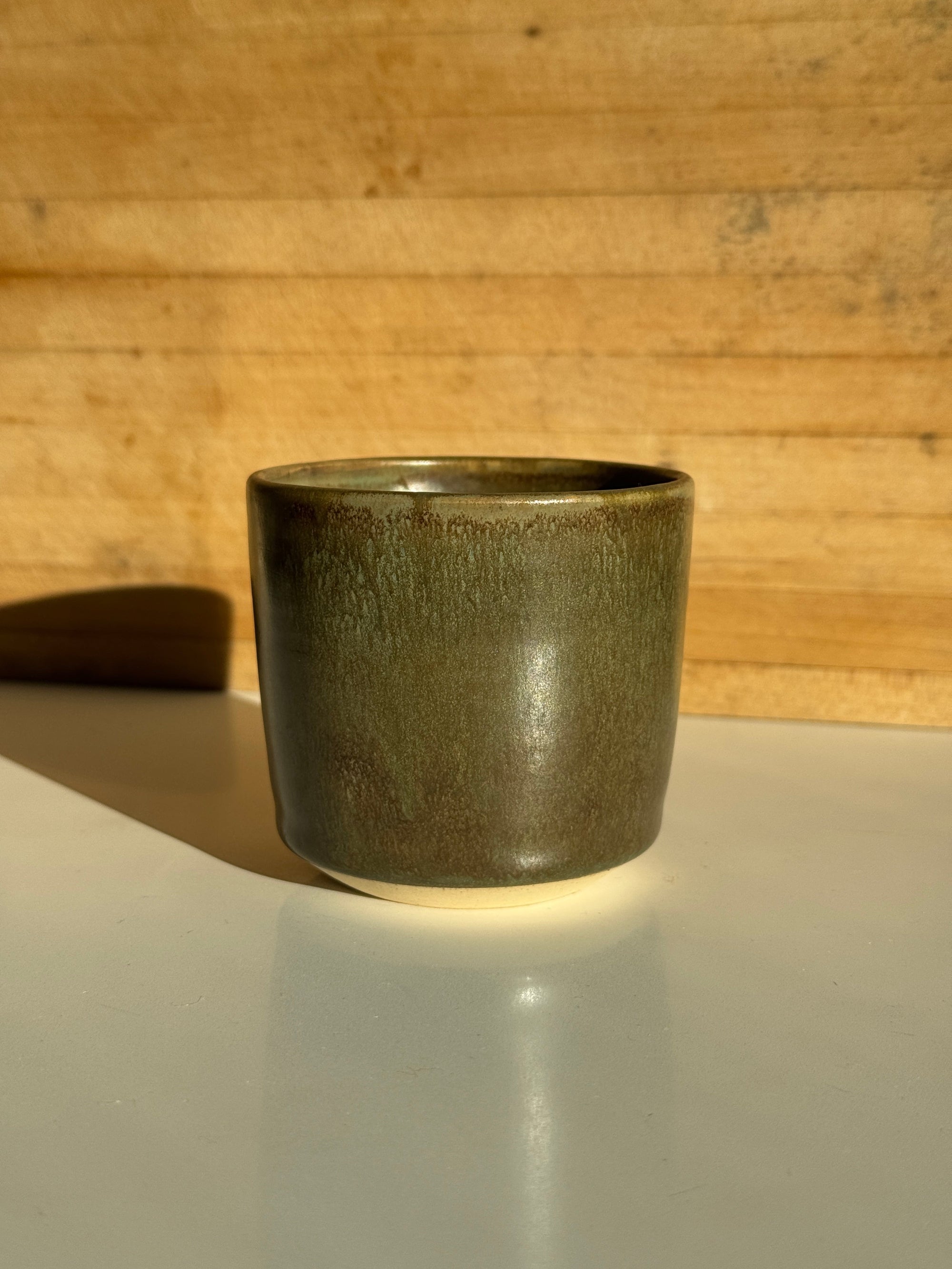 Ceramic mug with olive glaze